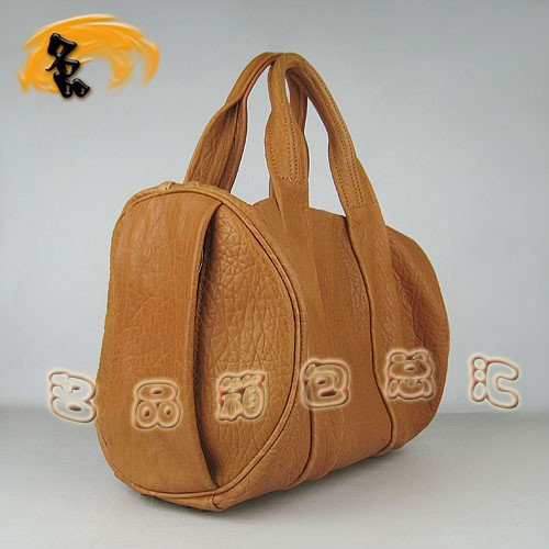 63460 熱賣新款明星酷炫 Alexander Wang/亞利山大王 鉚釘手提包 土黃色